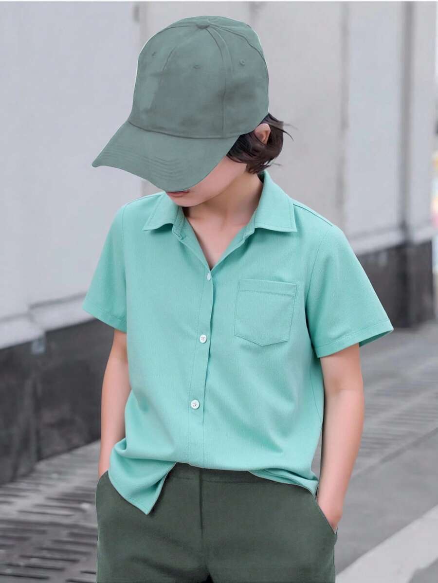 SHEIN Boys Loose Casual Textured Fabric Turndown Collar Open Front Real Pockets Design Shirt, Spring/Summer