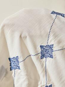 Easelle Top ample femme avec col en V brodé de style vintage nomade