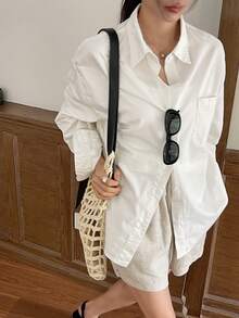 DAZY Blusa de manga larga de unicolor con un botón delantero y bolsillo para mujer