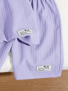 SHEIN Tenue décontractée de style coréen pour garçons préadolescents: pull-over à col montant avec fermeture éclair partielle, manches courtes et short tissé imprimé en 2 pièces
