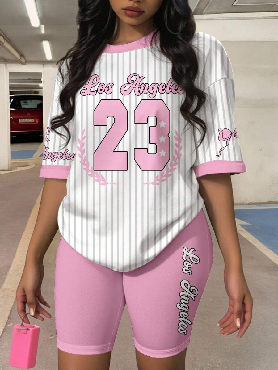 Slaydiva Women's Round Neck Contrast Trim Letter & Number Print Short Sleeve Top And Shorts Casual 2-Piece Set - Pink - View 1