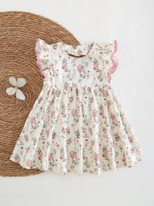 Cozy Pixies Abito da bambina con scollo tondo, maniche corte, vita arricciata e fantasia floreale ditsy