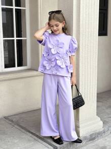 SHEIN Completo da ragazza tween in 2 pezzi: blusa con collo alto, maniche a palloncino e decorazione floreale 3D, pantaloni a vita alta e gamba ampia - Viola - Visualizzare 13