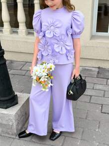 SHEIN Completo da ragazza tween in 2 pezzi: blusa con collo alto, maniche a palloncino e decorazione floreale 3D, pantaloni a vita alta e gamba ampia - Viola - Visualizzare 14