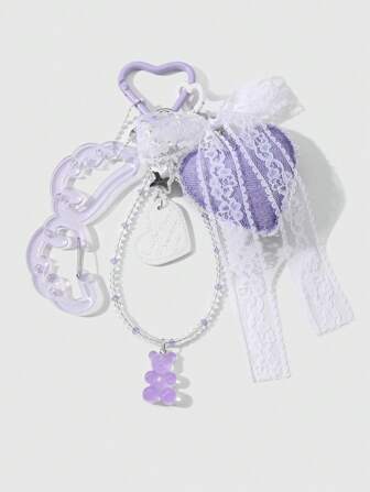 Kawaii 1 pièce Porte-clés/Charm de sac mignon, exquis et mode en acrylique avec nœud en maille, ailes creuses et ours en résine violette cristal-like. Convient pour les femmes, usage quotidien et cadeau.