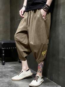 Manfinity Homme Pantalones cortos holgados tipo capri y estilo casual con estampado nacional para hombres