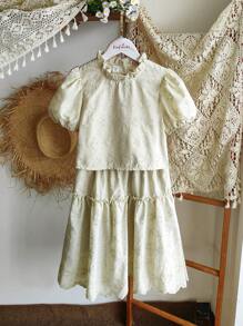 SHEIN Tween Girls Summer Casual Solid Color Hollow-Out Embroidered Shirt And Mini Skirt 2-Piece Set