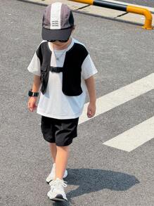 Set de 2 piezas de ropa casual deportiva para niños jóvenes - Camiseta de manga corta con estampado de texto oversize y pantalones cortos cargo negros, adecuado para viajes, escuela y primavera/verano