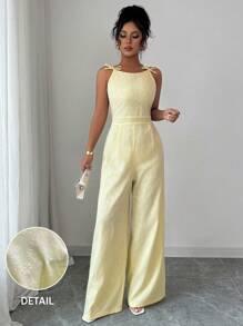 Elenzga Elegante mono de pierna ancha con decoración de lazo en los hombros y estampado floral de margaritas en tela de brocado, adecuado para el uso diario