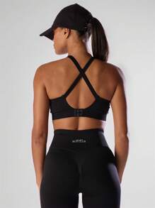 Musera Sport Áo ngực thể thao dáng ngắn, lưng chéo, dày dặn, không đường may, có logo phía trước, thích hợp cho tập luyện thể dục, chạy bộ, câu lạc bộ, Padel, Tennis, Pickleball, tập gym và thể hình. - màu đen - Xem 2