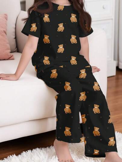 طقم بنطال وبلوزة قصيرة الأكمام ضيق المقاسات بتصميم بسيط لفتيات شابات، مناسب للاستخدام المنزلي في الصيف