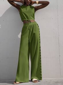 Aveloria Modichic 全新法式时尚度假简约优雅品质女装纯色几何刺绣镂空圆领无袖抽绳短款上衣和阔腿裤两件套