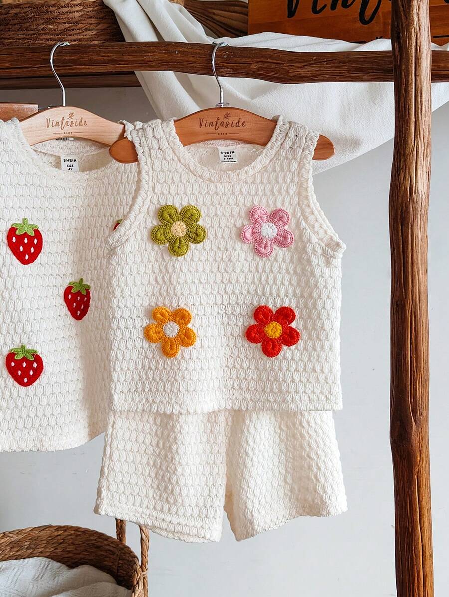 SHEIN Vintaside Kids Baby Mädchen Sommer Set aus ärmellosem Oberteil mit rundem Ausschnitt und modischem Blumendruck sowie passenden legeren Shorts, geeignet für zu Hause, Lässig, Outdoor-Aktivitäten und Treffen mit Freunden - Aprikosenfarben - Übersicht 1