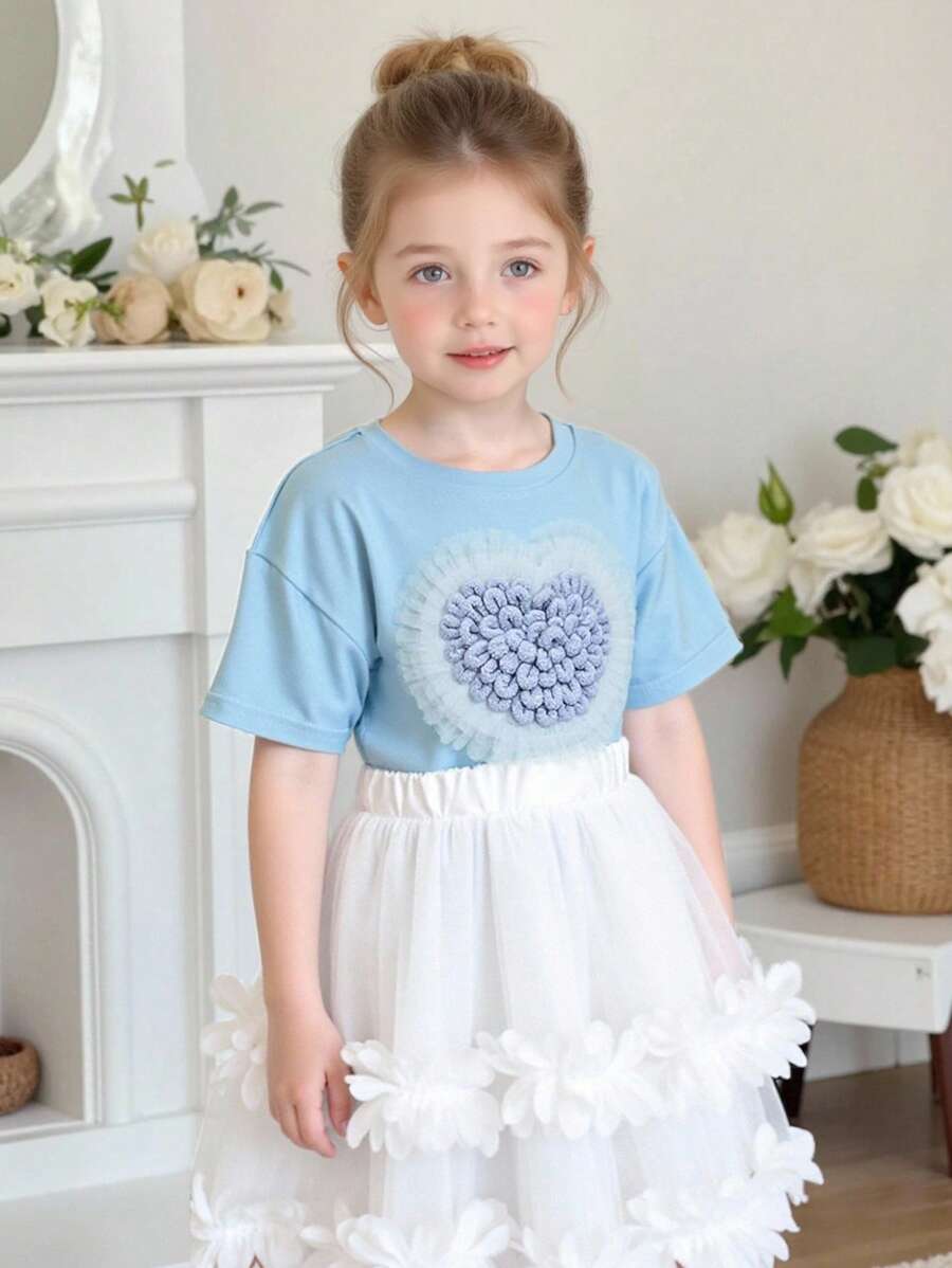 SHEIN 2 pezzi Set bambina - maglietta a maniche corte con scollo tondo e cuore 3D + gonna a ruota stile torta. Design elegante a cuore 3D, gonna a ruota stile torta, adatta per gioco all'aperto, casual a casa, attività scolastiche, feste di compleanno e altre occasioni, permettendo alla tua piccola principessa di godersi l'estate gioiosa! - Multicolore - Visualizzare 1