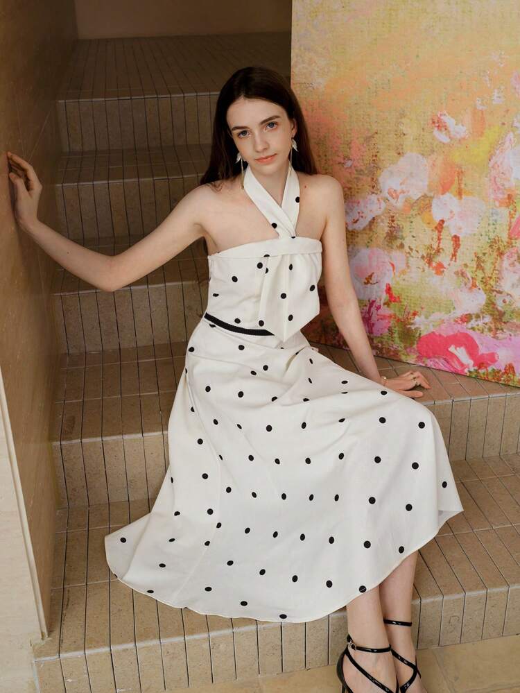 VESTIDO DE BAINHA FLARE COM ESTAMPA DE BOLINHAS REVERSÍVEL