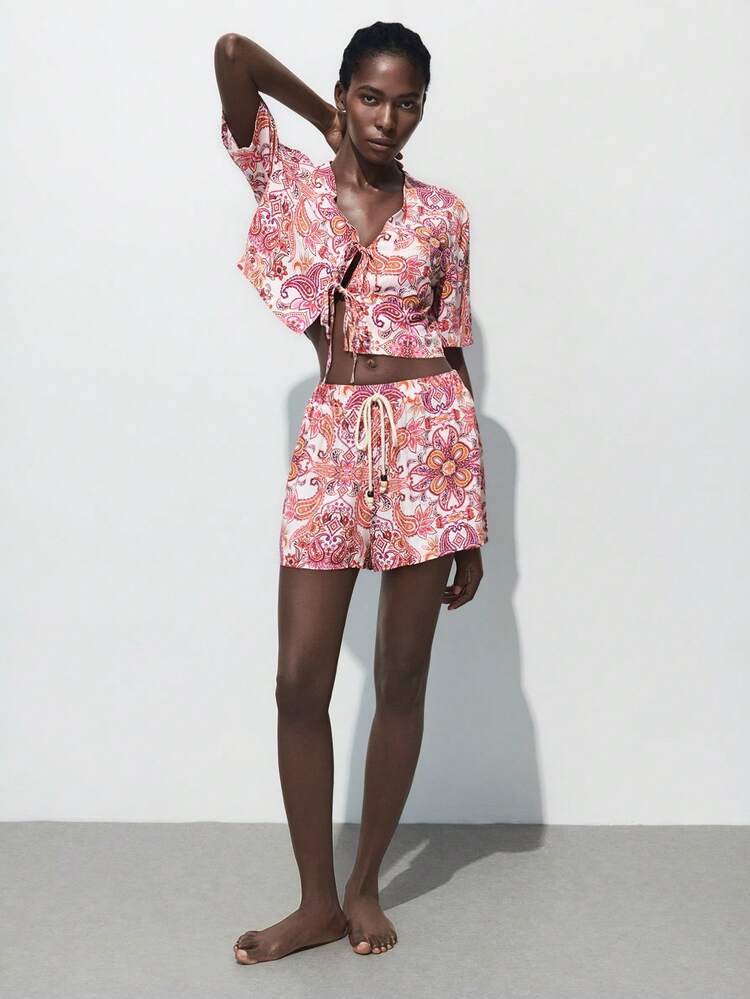 SHEIN Maija Pink Symmetrical Print Holiday Style V-Neck Crop Top, Casual Loose And Comfortable Women's Two Pieces Suit, Holiday Bohemian Beachwear, Comfortable And Versatile