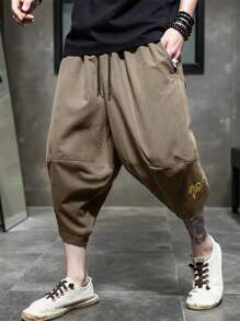 Manfinity Homme Pantalones cortos holgados tipo capri y estilo casual con estampado nacional para hombres