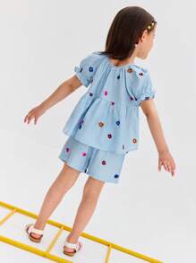 Leap Crew Leap Crew Conjunto de 2 piezas de camisa de manga abullonada y pantalones cortos con dobladillo con volantes, de corte holgado y sencillo, cómodo, para niñas jóvenes - Azul - Ver 2