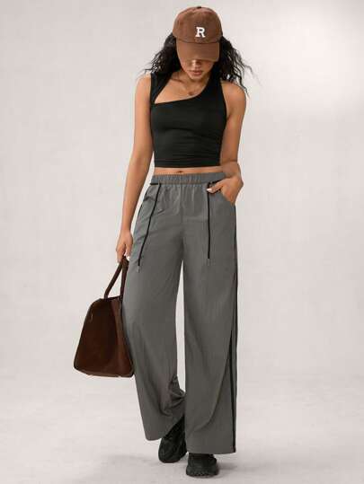 Hanevo Pantalones informales de mujer con cordón, cintura elástica, bolsillos y color de contraste, para uso diario