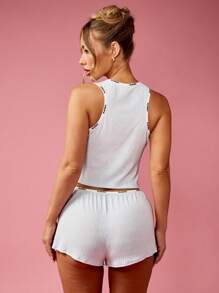 Missguided x Playboy Conjunto de pijama con botones y textura acanalada, con mini shorts, para Navidad - Azul - Ver 2