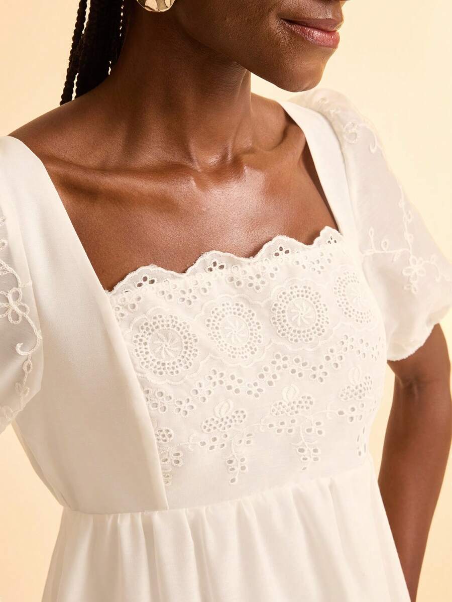 CAJUNI 女式夏季休闲度假海滩白色迷你连衣裙，带荷叶边下摆和泡泡袖 - 白色 - 查看 1