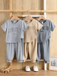 SHEIN 6pcs Baby Boy Casual Versatile Solid Color Simple Letter Embossed Short Sleeve T-Shirt & Elastic Waist Pants Set, All-Match Multi-Piece Outfit - Multicolor - View 4