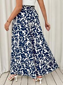 SHEIN Tall CURVE Pantalones anchos con estampado de plantas y bolsillos para mujer de talla grande, ideales para vacaciones