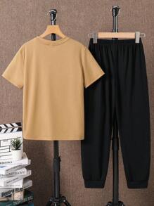 2 Stück/Set Jungen-Freizeitkleidung im College-Stil, bequem und modisch, einfach und praktisch, weiches Shirt mit Buchstaben-Grafik am Rundhalsausschnitt und kurzen Ärmeln sowie Hose mit elastischem Bund, geeignet für Herbst, Frühling, Sommer, passend für den täglichen Gebrauch, Outdoor, Schule, Straße, Partys und Lässig Zuhause