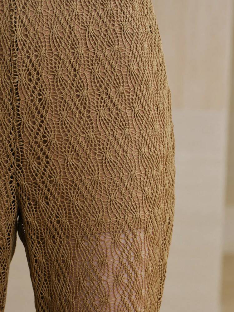 PANTALÓN DE CAMPANA TRANSPARENTE