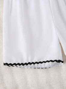 Conjunto de blusa y pantalones cortos para niña con recortes a color y decoración de lazo, informal de verano