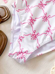 Maillot de bain une pièce pour pré-adolescente avec imprimé papillon, idéal pour les vacances à la plage