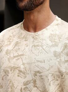 Manfinity CasualCool Camiseta de manga corta de cuello redondo con estampado completo para hombres de talla grande