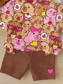 SHEIN 2 件套年轻女孩休闲宽松短袖圆领 T 恤和紧身短裤套装，带有可爱的水豚图案，粉色和棕色，适合寒冷的夏天