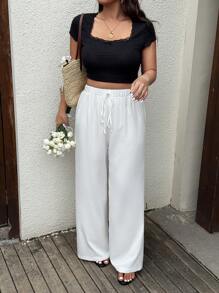 SHEIN Tall Pantalones largos cómodos y casuales con cintura anudada en unicolor para mujeres de talla grande