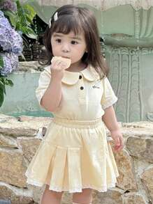 Dazy Kids Set de 2 piezas: Camisa de polo de manga corta informal y falda plisada para niñas pequeñas - Amarillo - Ver 6