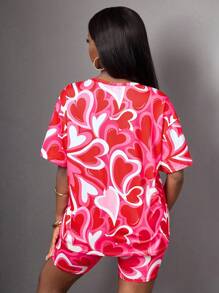 SHEIN Completo sportivo da ragazza con maglietta a maniche corte con grafica cuore e pantaloncini, tie-dye, adatto per la primavera/estate