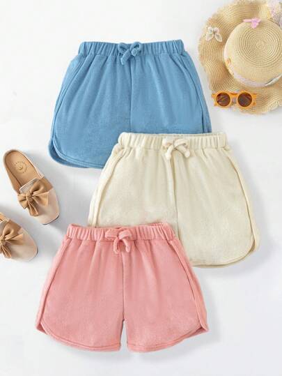 女童休闲基本款纯色针织毛圈运动短裤，适合通勤和户外穿着