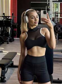 Innovista Bộ đồ thể thao ôm sát và cực kỳ gợi cảm, bộ 2 món/bộ tập gym năng động, bộ đồ tập luyện đồng bộ, áo ngực và quần short, không gây khó chịu khi ngồi xổm, độ co giãn cao và thấm hút mồ hôi, áo mềm mại như bơ và quần thể thao cạp cao, nâng tầm bài tập, vừa vặn tự tin, hiệu suất cao cấp, áo croptop không tay, không gọng, thiết kế lưới khoét và rỗng, bộ đồ thể thao nữ tạo vẻ ngoài thanh lịch, phong cách đường phố năng động. - màu đen - Xem 6