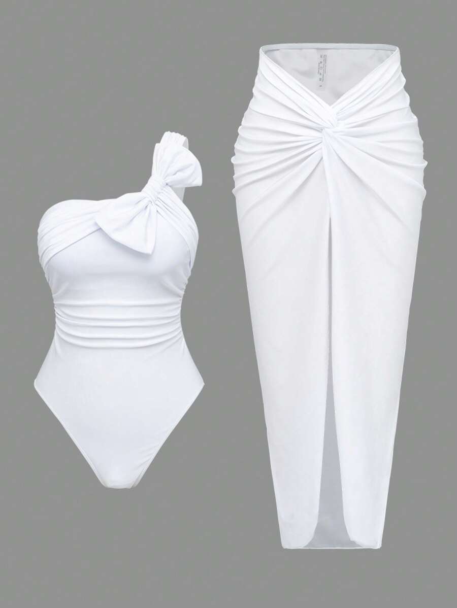 Swim Oasis 2 件套女式亮面纯色连体泳衣，带大蝴蝶结装饰和扭纹网眼沙滩裙，优雅度假装