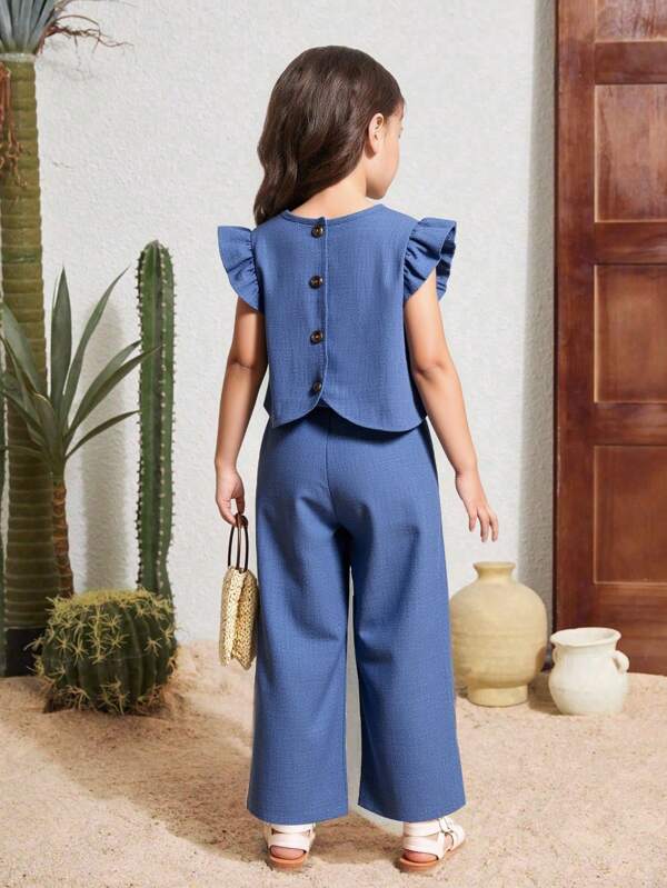 Conjunto de niña (talla pequeña) con camiseta de manga corta con textura y botones en la espalda y pantalones casuales largos