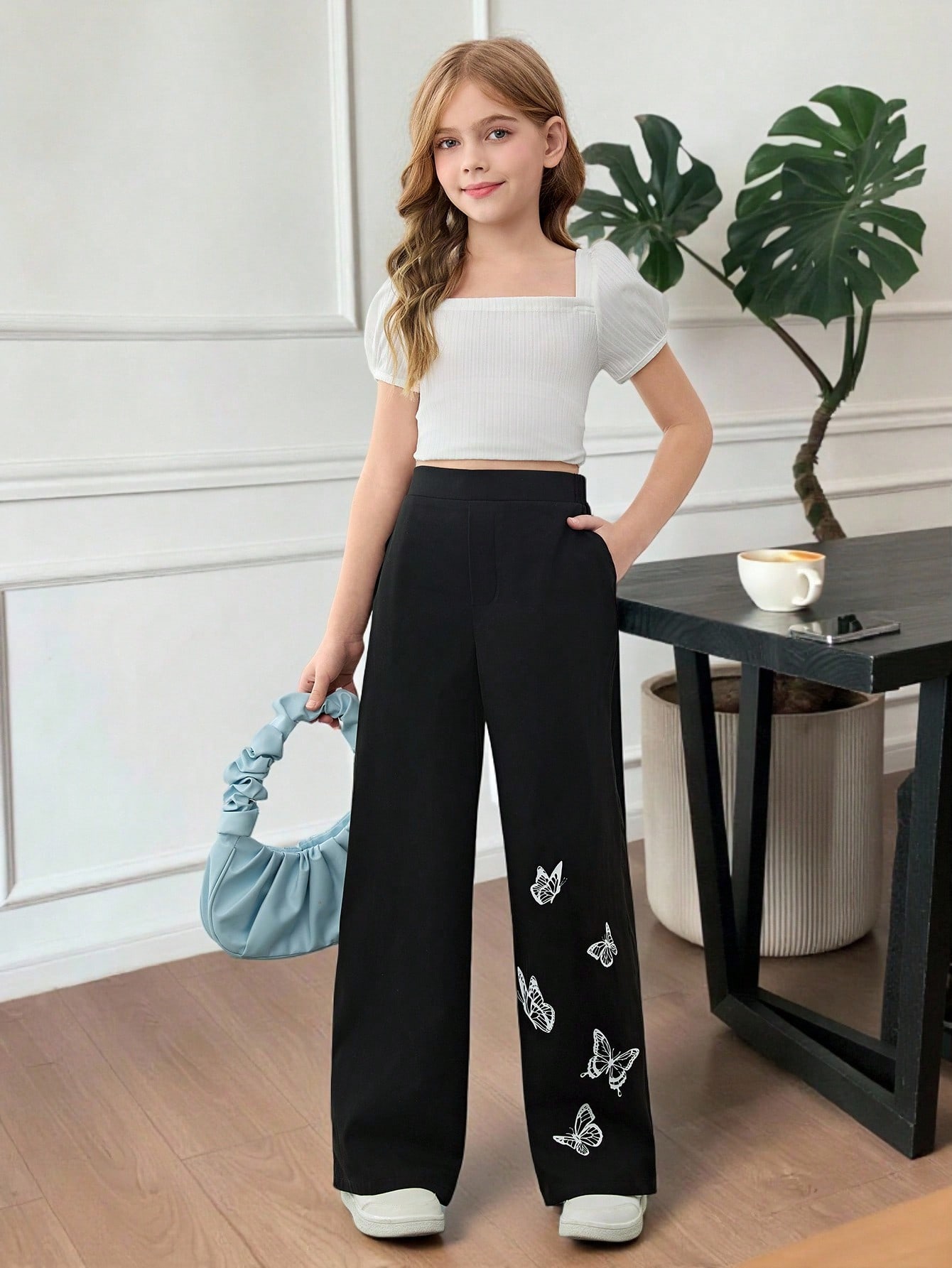 SHEIN بنطلون أسود فضفاض بقصة ساق واسعة مع طباعة وض...