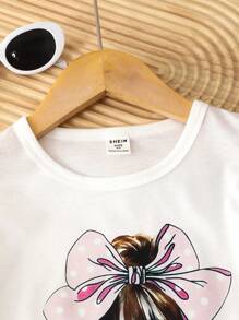 2 件套女孩卡通图案圆领盖袖 T 恤 + 波尔卡圆点粉色裤子套装，适合年轻女孩的时尚休闲装