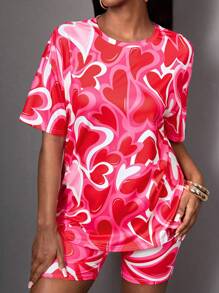 SHEIN Completo sportivo da ragazza con maglietta a maniche corte con grafica cuore e pantaloncini, tie-dye, adatto per la primavera/estate