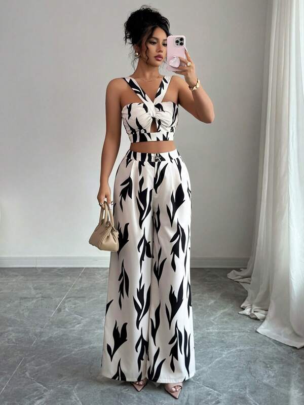 Elenzga Set de 2 piese pentru femei, top fără mâneci cu model abstract și pantaloni cu croi larg, ținută elegantă de vacanță/navetă