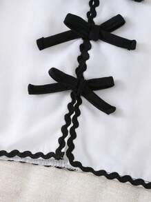 Conjunto de blusa y pantalones cortos para niña con recortes a color y decoración de lazo, informal de verano
