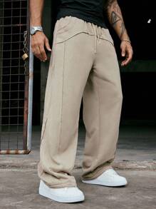 PAVTROS Pantalon de survêtement casual pour hommes Manfinity Streetrush, design à ourlet effiloché, style streetwear, coupe ample et jambe droite. Vêtements pour hommes, pantalons pour hommes, survêtements amples pour hommes, pantalons décontractés pour hommes, survêtements pour hommes, survêtements amples pour hommes, cadeaux pour petit ami, streetwear pour hommes