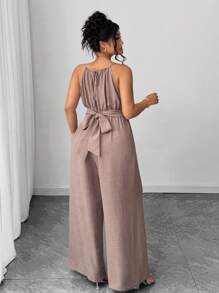 Elenzga 大码女式休闲卡其色褶皱面料肩带交叉领口串珠腰部纽扣和蝴蝶结设计喇叭形连体裤，适合春夏季、学校、毕业典礼、情人节、音乐节、母亲节、万圣节、感恩节、复活节、国庆节、联欢晚会、约会、派对、婚礼、户外旅行 - 卡其色 - 查看 2