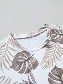 Manfinity RSRT Conjunto de verano para hombres con camiseta de manga corta estampada con árboles de palma y pantalones cortos con cordón en la cintura para vacaciones