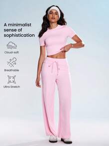 Eassivo Set de 2 piezas de ropa deportiva de verano para mujer, que incluye top de manga corta sólido y pantalones con nudo, conjunto de ropa deportiva de color rosa para hacer ejercicio - Rosa - Ver 2