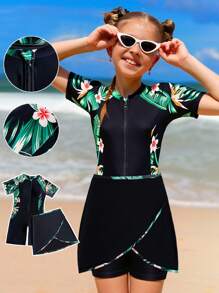 Traje de baño de una pieza con estampado floral para niñas preadolescentes, con cierre de cremallera frontal, manga corta y short negro integrado con patrón de flores estampado a los lados, tipo conjunto de dos piezas